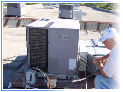 Technician working on an Air Conditioning Unit